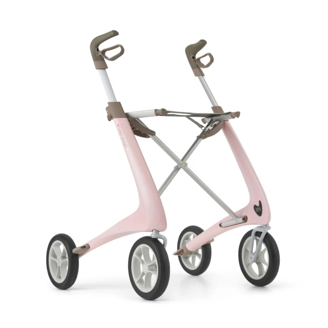 The ByACRE Ultralight Carbon Fiber Rollator (10.6 lbs) features four large wheels, a pink and beige frame, ergonomic handles, and a sleek design—combining modern style with lightweight, reliable mobility support.